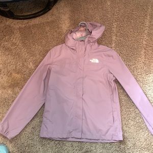 NEW NORTH FACE RAIN JACKET. never worn amazing condition.